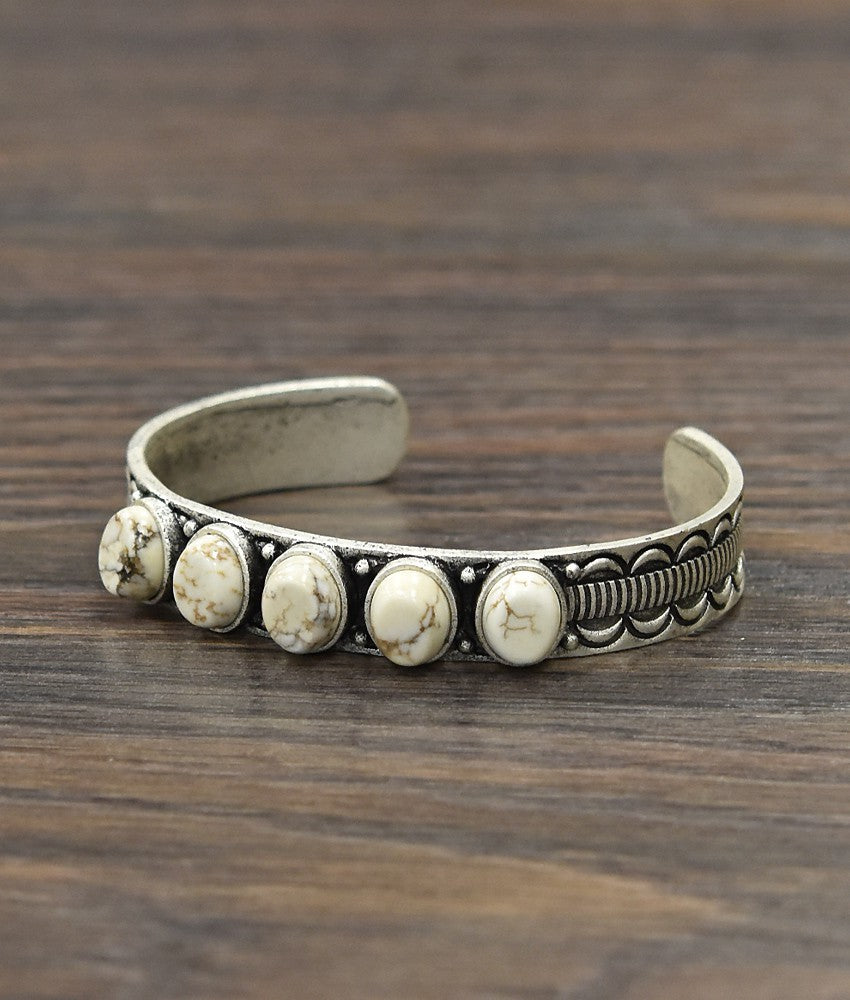 White stone cuff